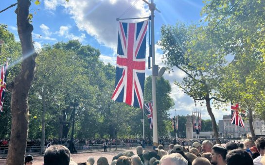 Crowds await the Queen's coffin procession