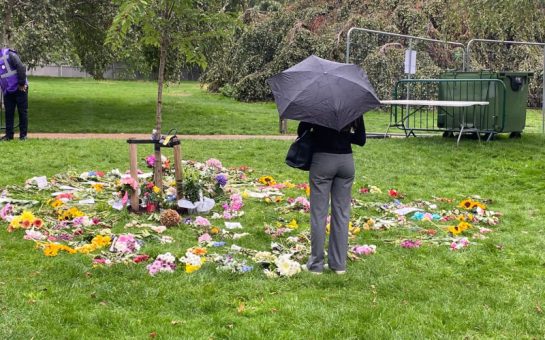 Mourners prepare for the arrival of the Queen's coffin