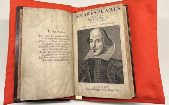 Shakespeare's First Folio on a red cushion