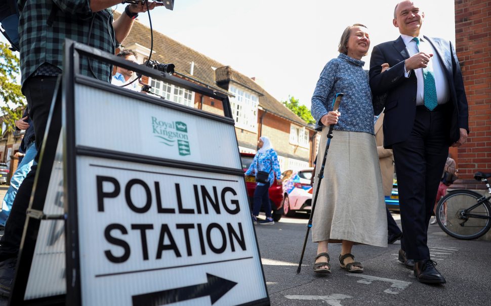 Ed Davey and his wife outside a polling station