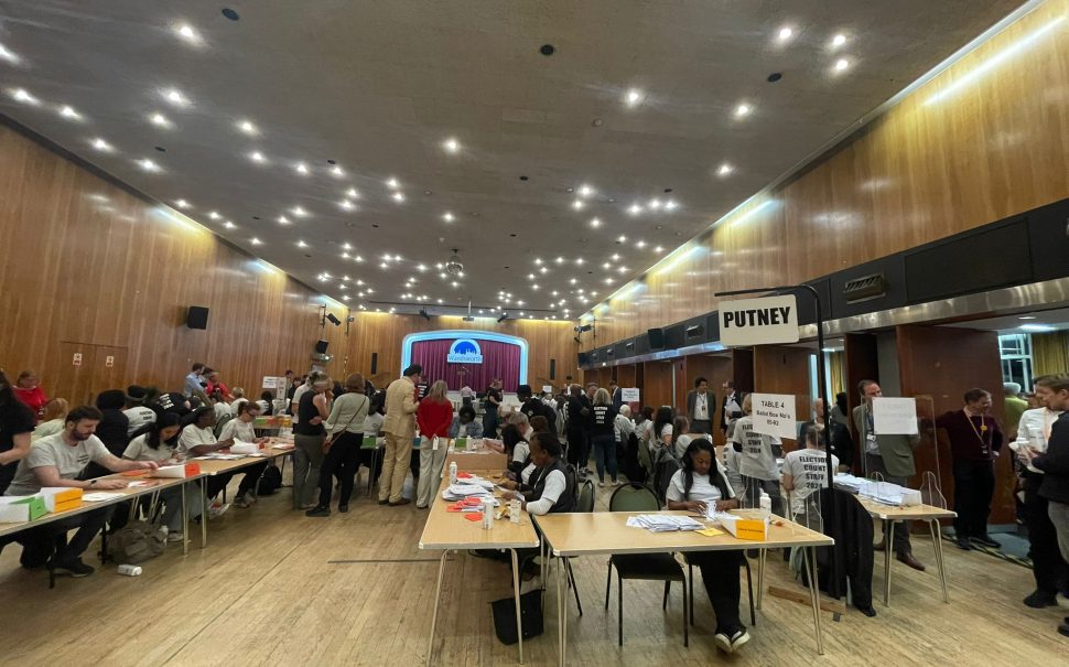 Photo of people counting ballots in Putney in the General Election in London
