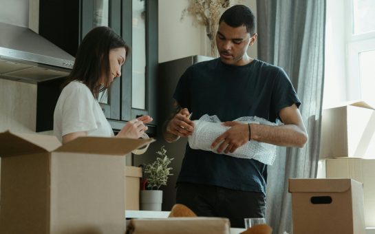 Couple packing ahead of a move