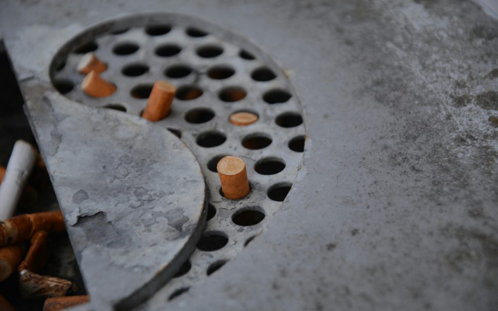 Cigarettes being stubbed out.