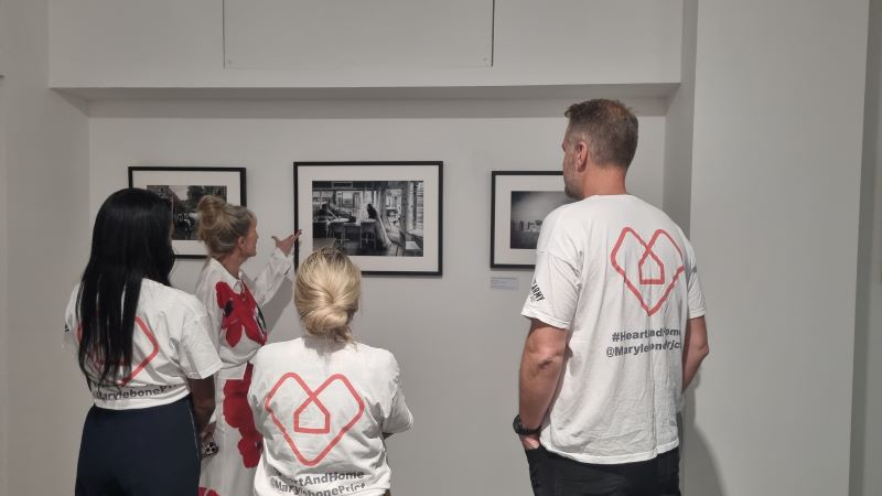 Photographer Honey J Walker and Marylebone Project charity staff at the 'Are You Next To An Angel?' exhibition.