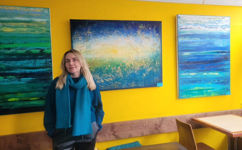 Magdalena Del Mar with her artwork