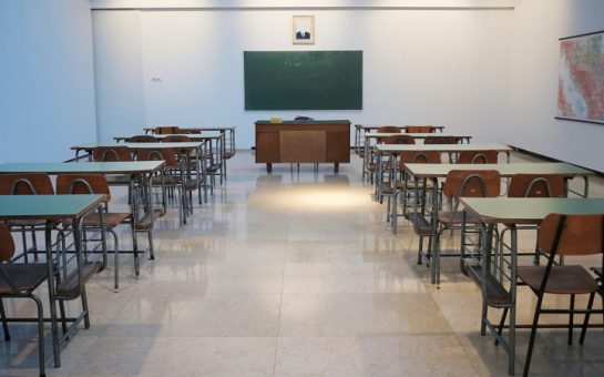 Empty classroom image credit: Ivan Aleksic from unsplash.com