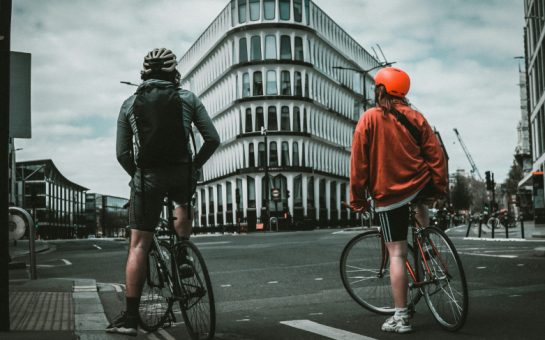 Two cyclists on a street