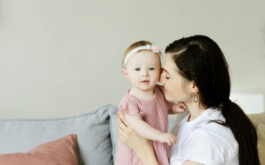 Stock image of a woman with a baby