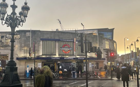 Exterior shot of Tooting Broadway Tube Station at sunset