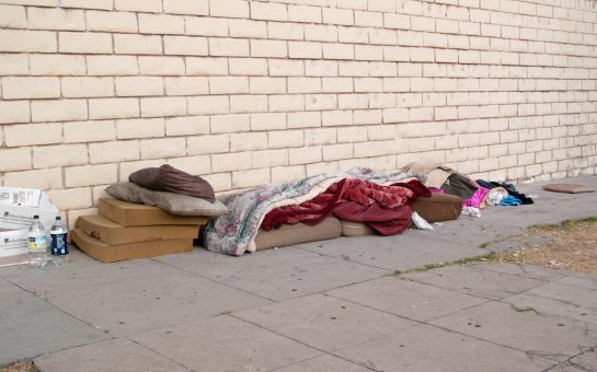 The bed of a homeless person on a street